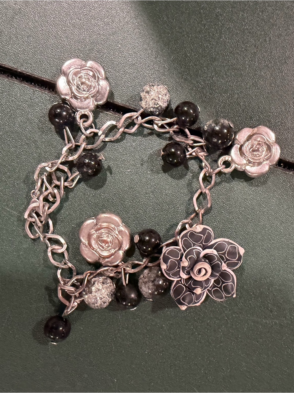 Silver Floral Charm Bracelet with Black Beads